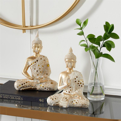 GOLD POLYSTONE BUDDHA MEDITATING SCULPTURE WITH ENGRAVED CARVINGS AND RELIEF DETAILING, SET OF 2 10″, 11″H